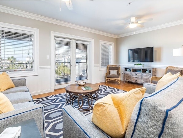 Brass Rail 306 Living Area with Sleeper Sofa and Flat-screen TV