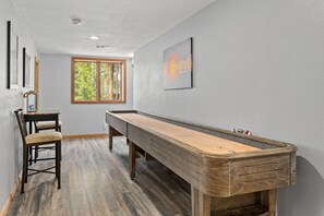 Enjoy a game of shuffleboard during your mountain getaway