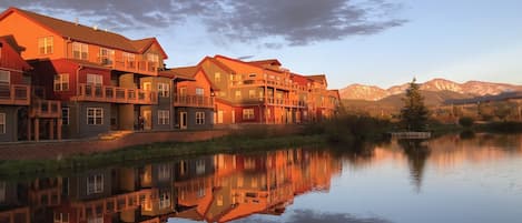 Condo overlooking private pond with Winter Park Ski Resort in background.