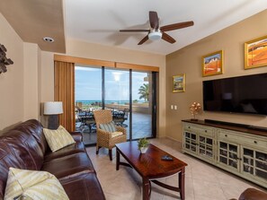 Modern spacious living room with ocean views.