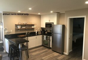 Kitchen and dining area of short term rental property.