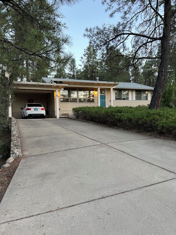 Car port right next to the front door for easy parking and access.