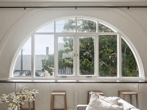 Beautiful arched window at front of apartment