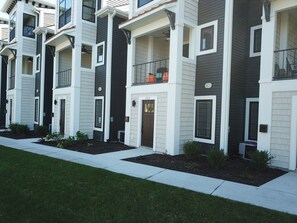 The front entryway with a relaxing porch above.