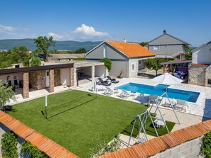 Sky, Cloud, Property, Building, Land Lot, Urban Design, House, Plant, Shade, Outdoor Furniture