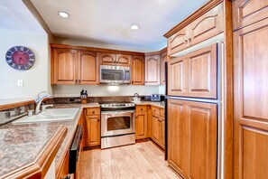 Prepare a meal in the equipped kitchen.