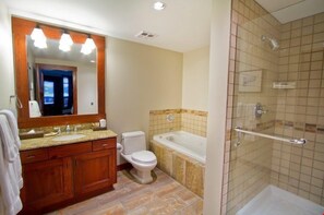 Get ready for the day ahead in the bright bathroom.