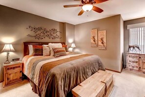 Get a good night's sleep in the master bedroom. Bedding configurations vary.