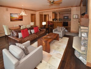 Chat with friends and family in the living area.