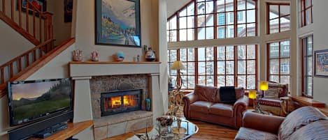 Take a seat in front of the cozy fireplace after a day on the mountain.