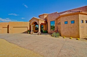 Front house elevation with 3 car garage.