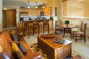 Kick up your feet and relax in the cozy living room.
