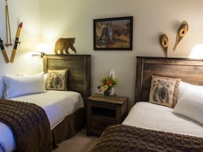 The cozy second bedroom may feature a variety of bedding options!