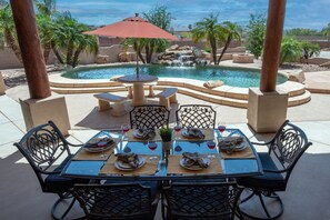 2 of the 4 Dining areas on back patio. Pool, Fire-pit