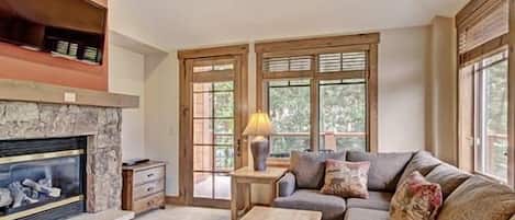 Kick back your feet and relax in the spacious, bright living room.