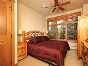 Get a good night's rest in the spacious master bedroom.