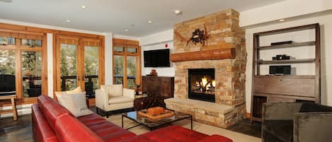 Snuggle up in front of the TV and the fireplace after a day on the slopes!