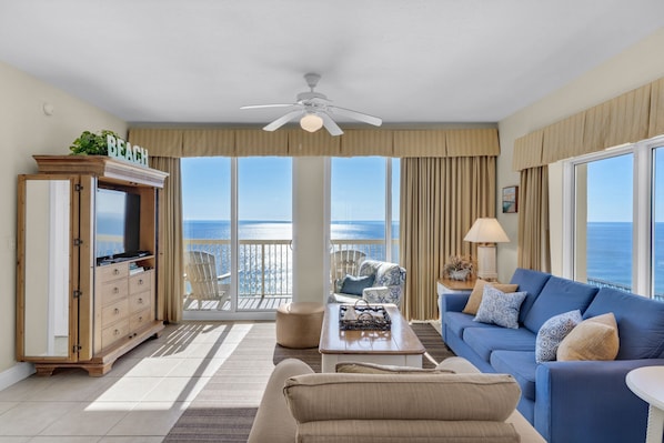 Wrap-around view with nothing but ocean, beach, pier and sky!