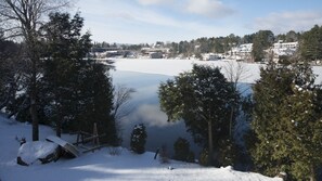 Winter scene view from balcony of the lake and Main Street across Mirror Lake