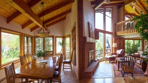 Dining and living room with fireplace -view from the kitchen