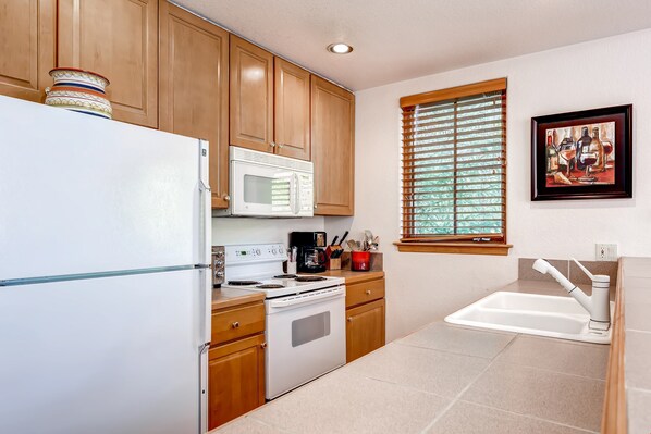 The lovely and fully-equipped kitchen has everything you need to cook