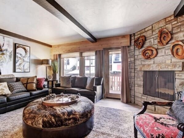 Kick back your feet and relax in the spacious, elegant living room.