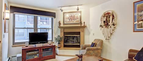 Warm up in front of the classic fireplace in our cozy unit!