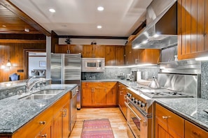 Take advantage of the gourmet, fully-equipped kitchen.