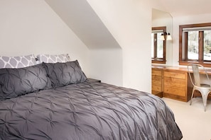 Get a good night's rest in the spacious master bedroom.