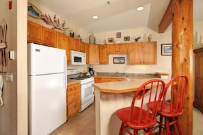 The fully-equipped kitchen features everything you need to cook while on vacation.
