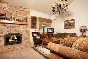 Warm up by the fireplace or entertain at the dining table.