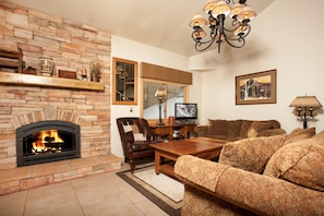 Warm up by the fireplace or entertain at the dining table.