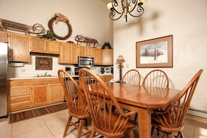 Entertain and enjoy meals together at the dining room table.