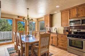 Enjoy cooking and dining in the gourmet kitchen with seating for 10