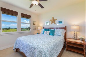 Master bedroom located on second level with golf course and ocean views