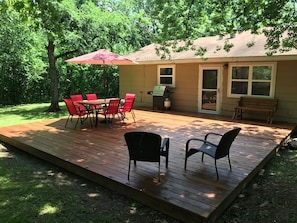 Back deck with lots of room to grill, eat or just visit. 