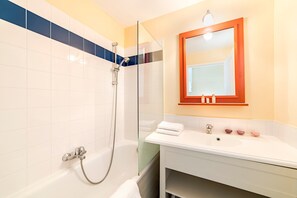 Get ready for the day in the modern and bright bathroom.