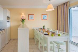 Entertain and enjoy meals together at the dining room table.