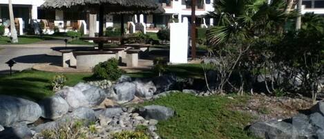 Grounds with 
Palapas, picnic tables  and water features