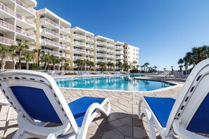 The beachside 5,000 sq. ft. pool with comfortable lounge chairs throughout.