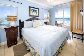 Rest in our master bedroom w/ a comfy King bed, full bath, & private balcony.