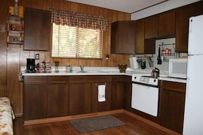 the kitchen...old school charm, but it is clean and it gets the job done!