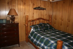 Master bedroom with queen bed.  The other bedroom has bunkbeds and queen sofabed