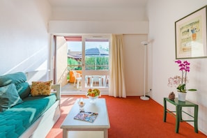Sink into the cozy sofa after a day exploring the area.