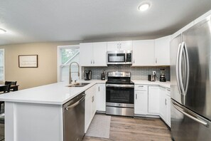 Kitchen Includes Keurig Coffee maker, Blender, toaster and cooking utensils