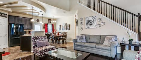 Living Room with the view of the Kitchen and Dinning Room