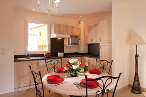 Entertain and enjoy meals together at the dining room table.