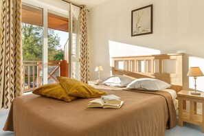 Relax on the luxurious bed after a day outside.