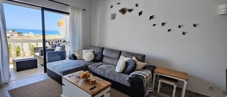 Living room with terrace and ocean view