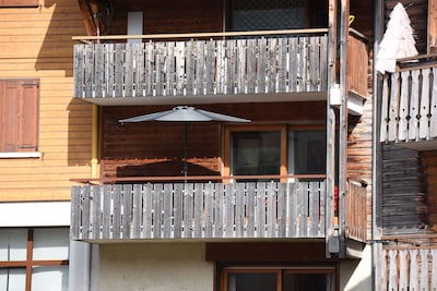 350m from the ski lifts, parking, in the village of La Clusaz